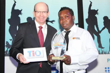 Vice-Chancellor Professor Simon Maddocks with 2015 CDU Art Award winner, Ishmael Marika