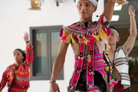 From left: Chen Fang Chen, Ting Wei Weng and Xiang Dai dancing a traditional Taiwanese dance.