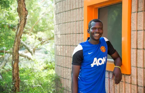 CDU student Felix Oryema smiling