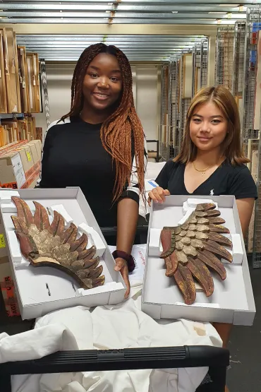 Agatha Sabamba and Lauren Jongue, Essington School year 10 work experience students display the custom-made boxes they made for the storage of Balinese sculptures.